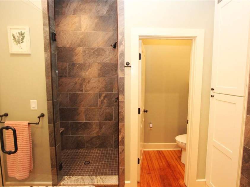 318 Camden Road, Wadesboro, NC 28170.  MLS# CAR3904497, YatesRealty ID 865. PRIMARY SHOWER WITH SEAT AND TOILET ROOM
