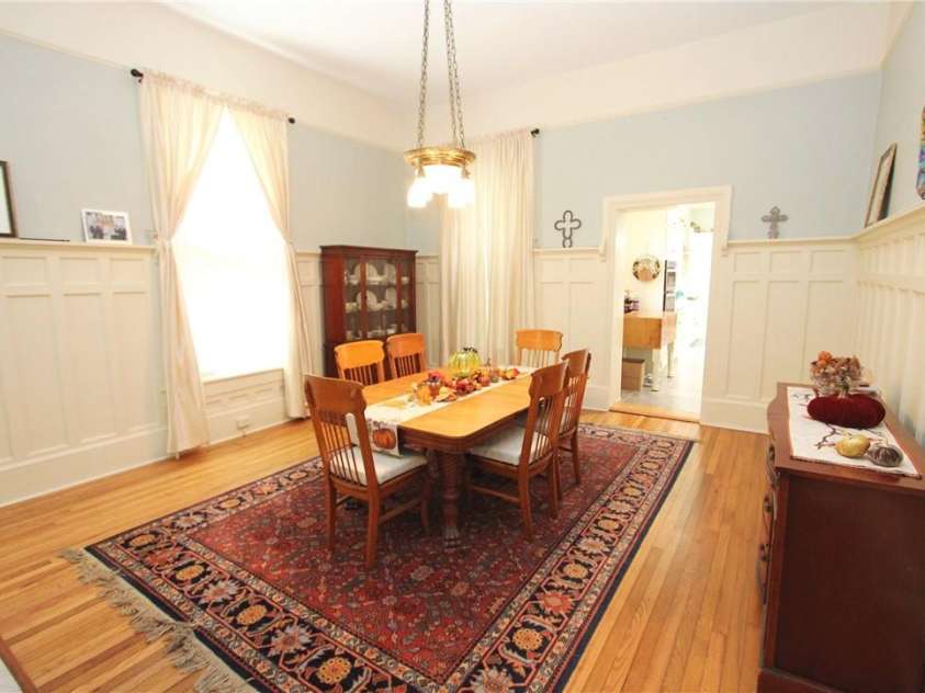 318 Camden Road, Wadesboro, NC 28170.  MLS# CAR3904497, YatesRealty ID 865. SO MUCH NATURAL LIGHT & WEINSCOATING WITH PLATE RACKS.  YOU CAN CHANGE YOUR ART FOR THE SEASONS!