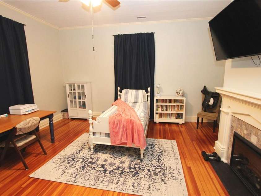 318 Camden Road, Wadesboro, NC 28170.  MLS# CAR3904497, YatesRealty ID 865. UPSTAIRS BEDROOM 3 & DESK AREA, FANS FOR ALL!