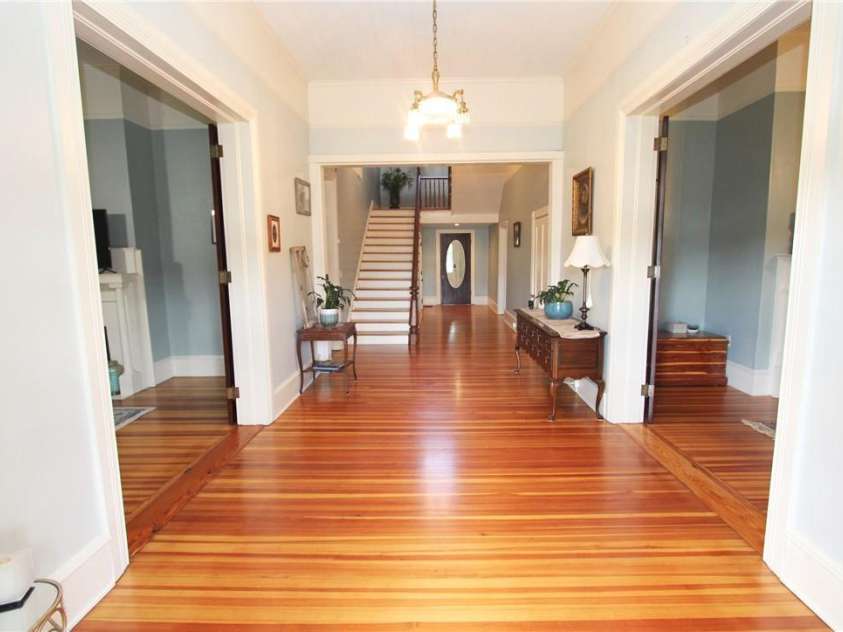 318 Camden Road, Wadesboro, NC 28170.  MLS# CAR3904497, YatesRealty ID 865. WOW! 12' CEILINGS, HEART PINE FLOORS THROUGH OUT.  LIVING ROOM TO THE RIGHT, DEN OR FAMILY ROOM TO THE LEFT.  YOU HAVE NEVER SEEN A MORE  PERFECT RENOVATION - THIS ONE WAS DONE WITH LOVE SINCE 2018 - 2022