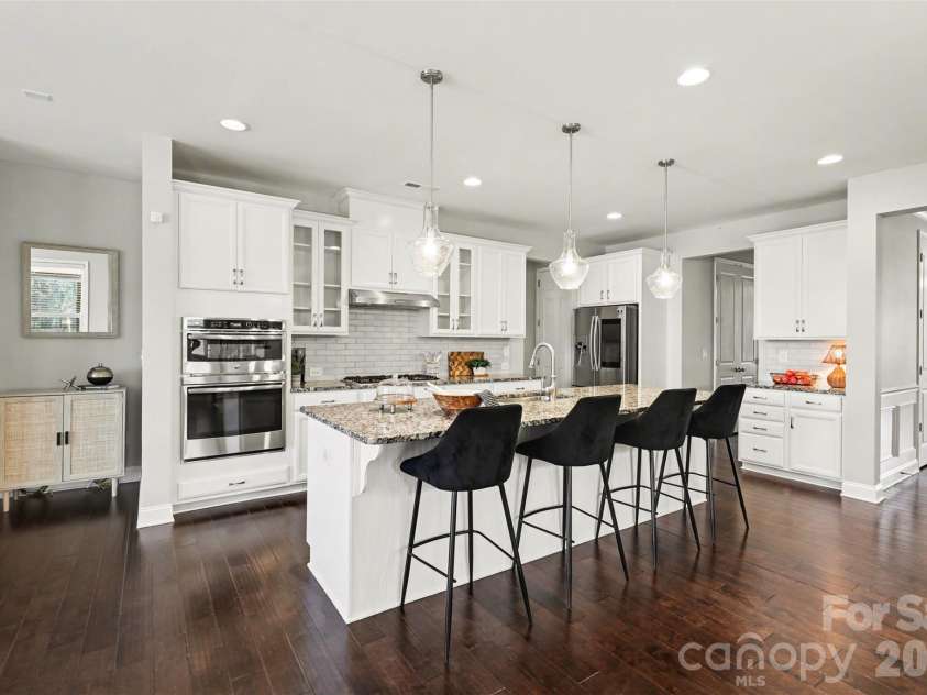 9528 Horsebit Lane, Concord, NC 28027.  MLS# CAR4347652, YatesRealty ID 8650. Kitchen Eat-in Island