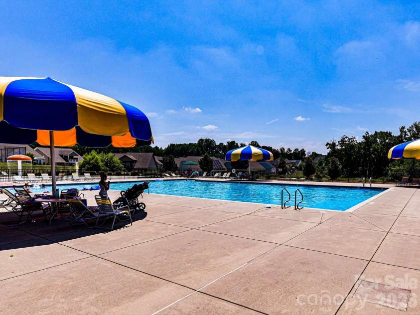 9528 Horsebit Lane, Concord, NC 28027.  MLS# CAR4347652, YatesRealty ID 8650. Olympic Pool