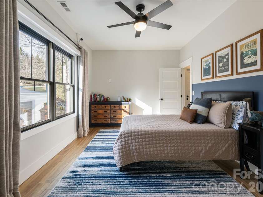 13 Cambridge Drive, Candler, NC 28715.  MLS# CAR4343251, YatesRealty ID 8656. Serene Guest Suite with Oversized Windows
