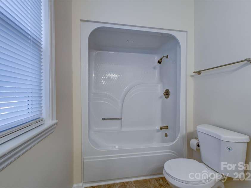 5909 Maple Street, Charlotte, NC 28269.  MLS# CAR4314238, YatesRealty ID 8661. Main Bathroom