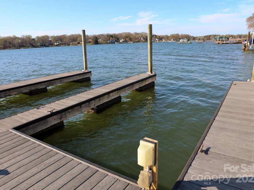 105 Beach Lane, Mooresville, NC 28117.  MLS# CAR4240933, YatesRealty ID 8681. Boat slip - far right second from end