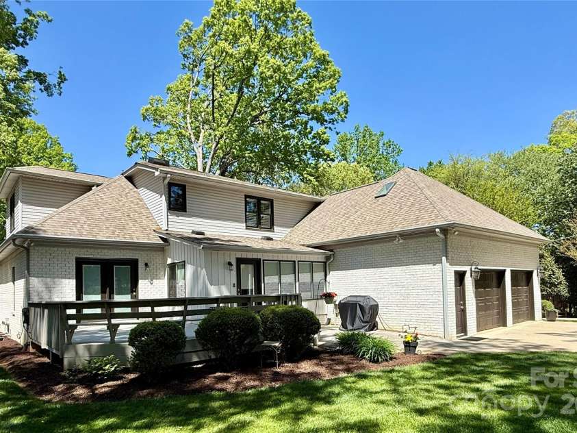 105 Beach Lane, Mooresville, NC 28117.  MLS# CAR4240933, YatesRealty ID 8681. Deck and back yard