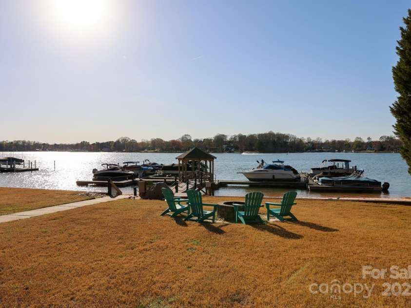105 Beach Lane, Mooresville, NC 28117.  MLS# CAR4240933, YatesRealty ID 8681. Firepit at beach area