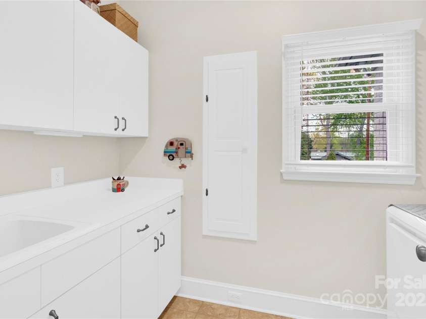 105 Beach Lane, Mooresville, NC 28117.  MLS# CAR4240933, YatesRealty ID 8681. First floor laundry room