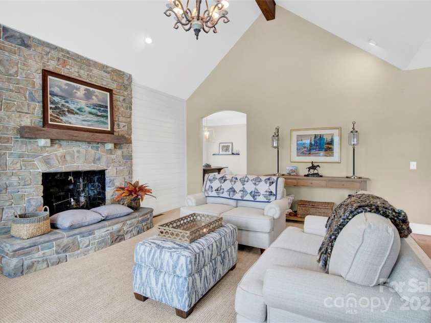 105 Beach Lane, Mooresville, NC 28117.  MLS# CAR4240933, YatesRealty ID 8681. Living room with fireplace