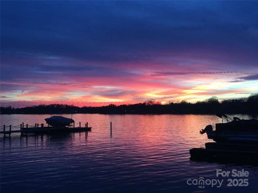 105 Beach Lane, Mooresville, NC 28117.  MLS# CAR4240933, YatesRealty ID 8681. Sunset at the beach area