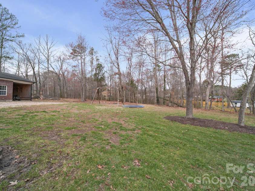 433 Laurel Crest Drive, Kannapolis, NC 28081.  MLS# CAR4345135, YatesRealty ID 8682. Large backyard for entertaining quests