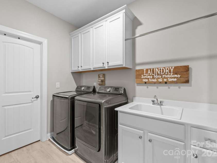 1052 Harlow's Crossing Drive, Weddington, NC 28104.  MLS# CAR4246716, YatesRealty ID 8684. 2nd floor laundry