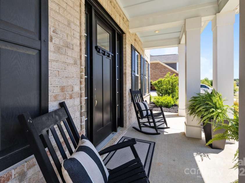 1052 Harlow's Crossing Drive, Weddington, NC 28104.  MLS# CAR4246716, YatesRealty ID 8684. Front porch