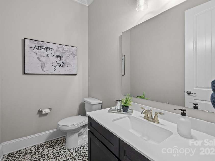 1052 Harlow's Crossing Drive, Weddington, NC 28104.  MLS# CAR4246716, YatesRealty ID 8684. Powder room