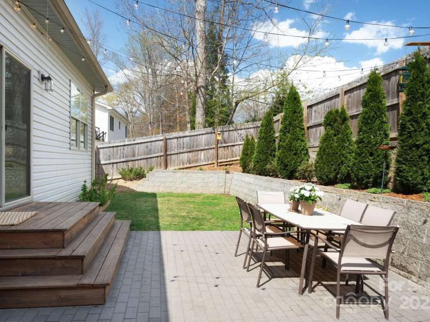 19 Dynasty Lane, Candler, NC 28715.  MLS# CAR4243539, YatesRealty ID 8687. Al-Fresco Dining Awaits