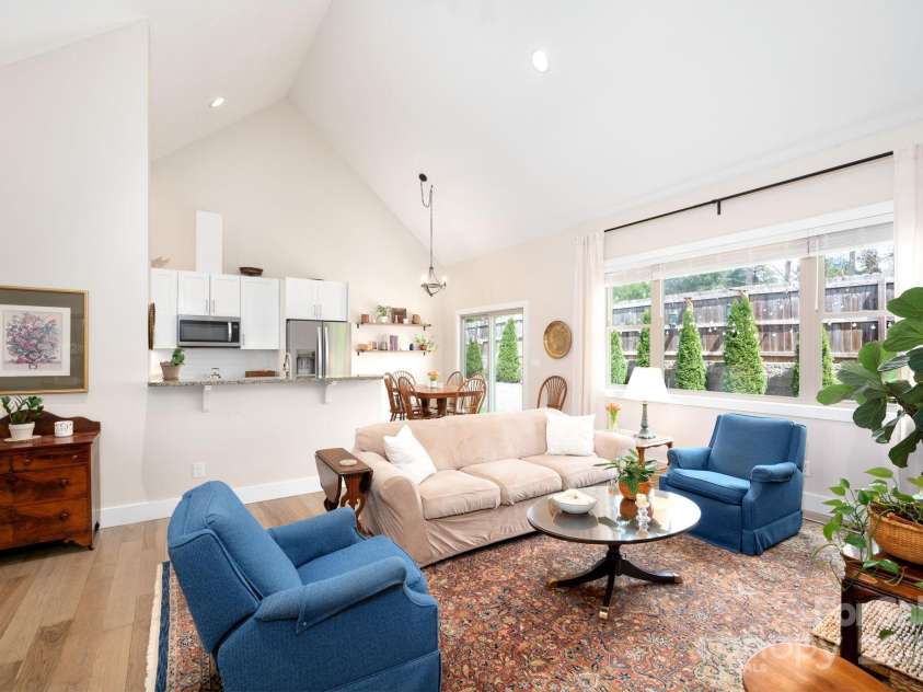 19 Dynasty Lane, Candler, NC 28715.  MLS# CAR4243539, YatesRealty ID 8687. Bright Living Room with Vaulted Ceiling