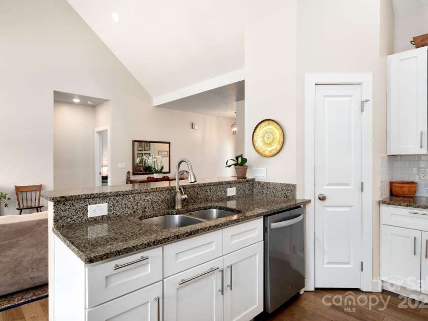 19 Dynasty Lane, Candler, NC 28715.  MLS# CAR4243539, YatesRealty ID 8687. Gorgeous Granite, a Breakfast Bar, and a Pantry Closet