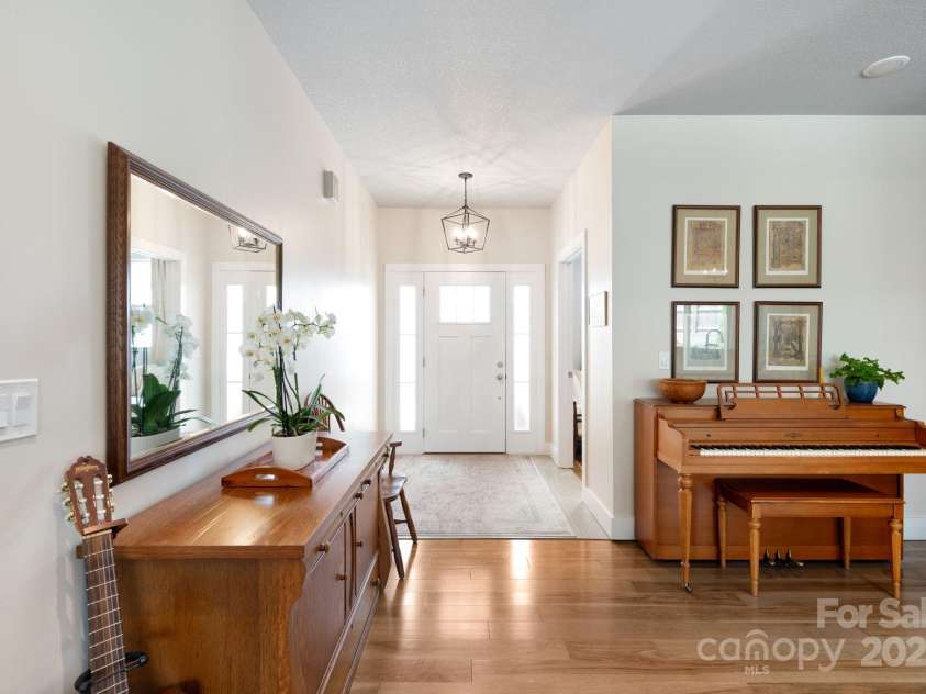 19 Dynasty Lane, Candler, NC 28715.  MLS# CAR4243539, YatesRealty ID 8687. Inviting Foyer with Coat Closet