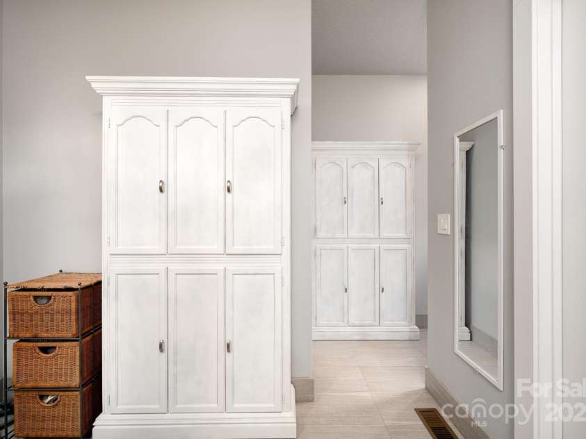 19 Dynasty Lane, Candler, NC 28715.  MLS# CAR4243539, YatesRealty ID 8687. Lots of Garment and Linen Storage (armoires do not convey)