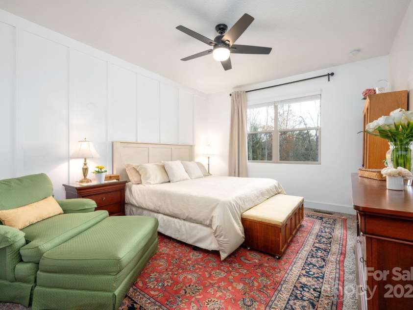 19 Dynasty Lane, Candler, NC 28715.  MLS# CAR4243539, YatesRealty ID 8687. Primary Suite Features a Board-and-Batten Wall Accent