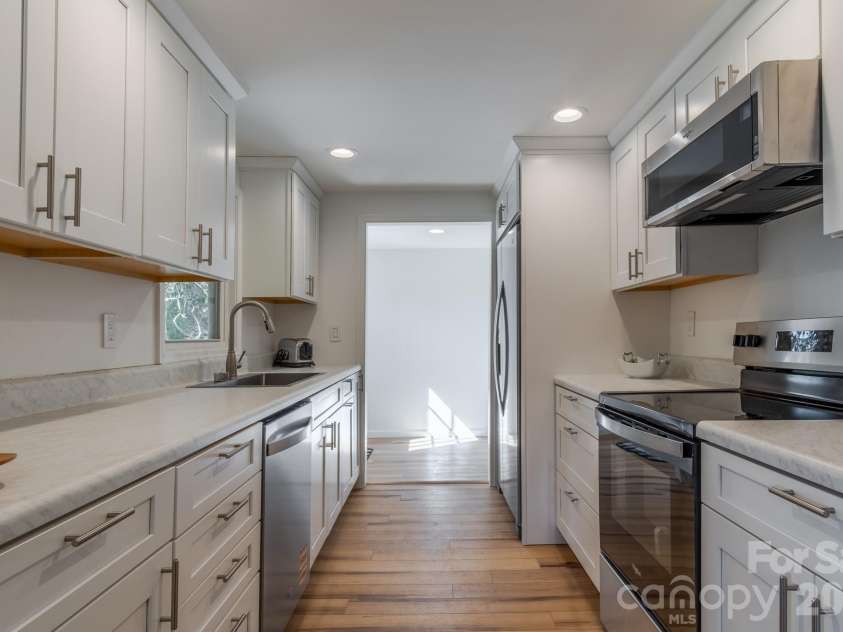 48 Elliott Road, Brevard, NC 28712.  MLS# CAR4347643, YatesRealty ID 8688. 