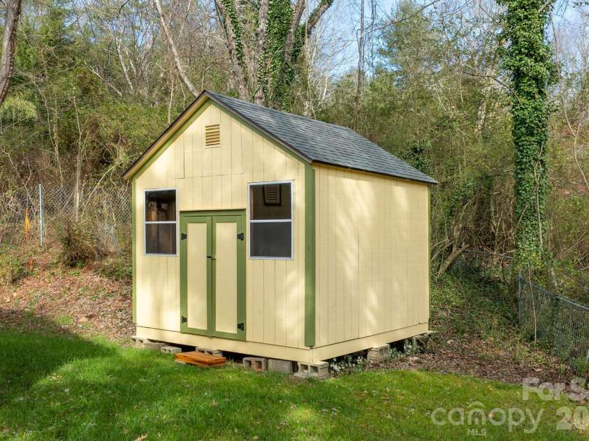 48 Elliott Road, Brevard, NC 28712.  MLS# CAR4347643, YatesRealty ID 8688. Detached shed