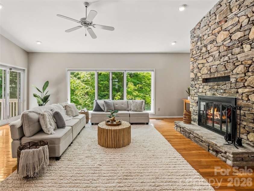 150 Sondley Parkway, Asheville, NC 28805.  MLS# CAR4280880, YatesRealty ID 8690. Custom stone fireplace