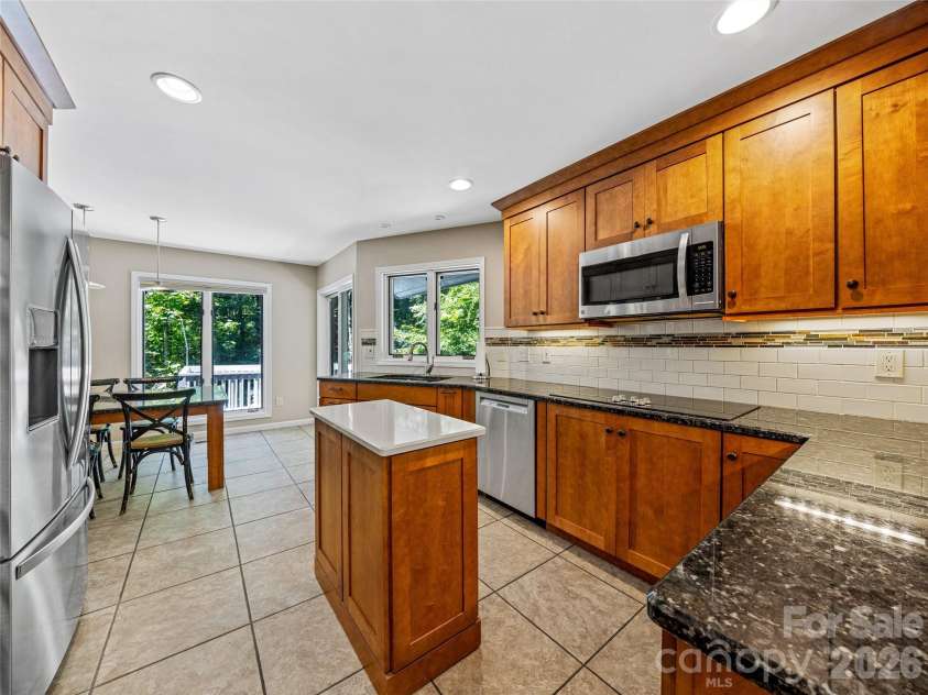 150 Sondley Parkway, Asheville, NC 28805.  MLS# CAR4280880, YatesRealty ID 8690. Large updated kitchen