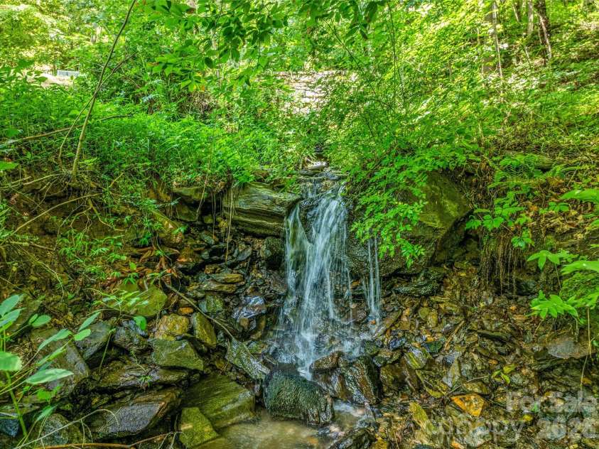 150 Sondley Parkway, Asheville, NC 28805.  MLS# CAR4280880, YatesRealty ID 8690. Natural Waterfall