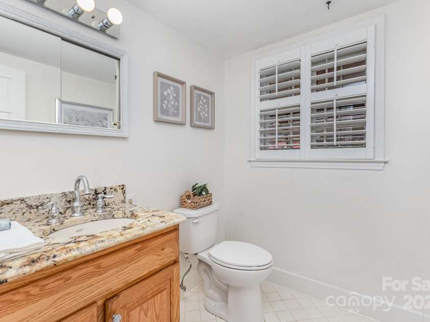 3916 Riverbend Road, Charlotte, NC 28210.  MLS# CAR4241946, YatesRealty ID 8693. Half bathroom Main Level