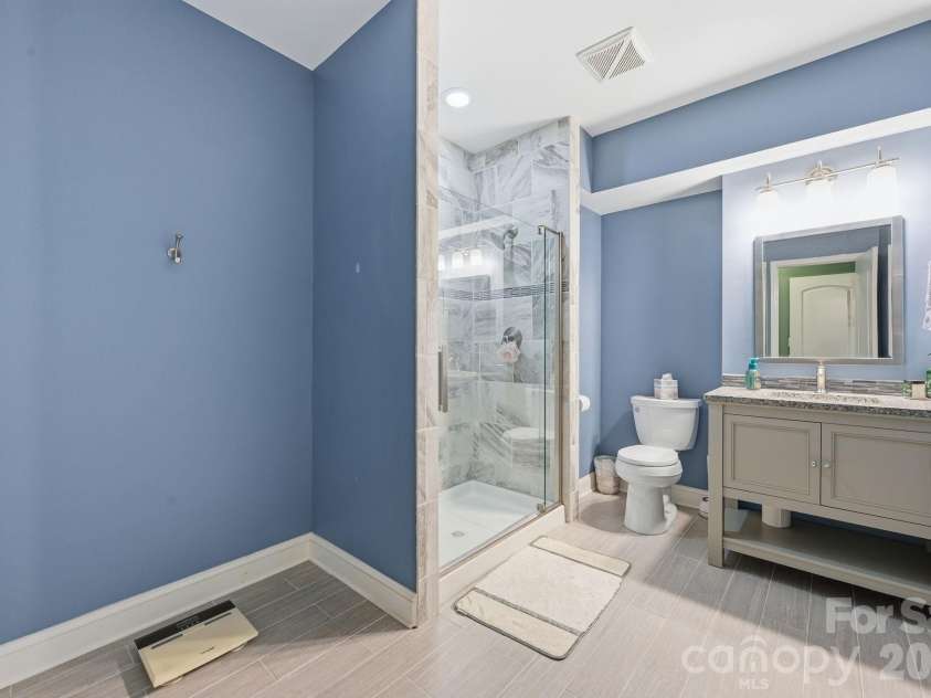 5041 El Molino Drive, Charlotte, NC 28214.  MLS# CAR4362342, YatesRealty ID 8694. Basement Bathroom