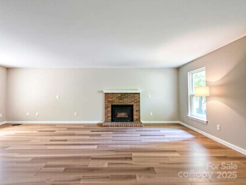 2113 Killarney Place, Charlotte, NC 28262.  MLS# CAR4247042, YatesRealty ID 8697. Empty living room