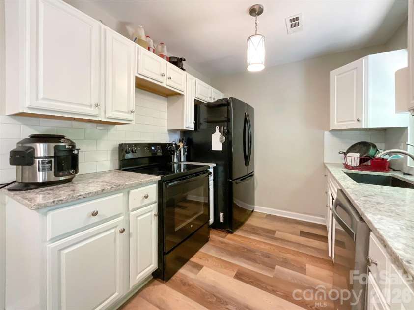 2113 Killarney Place, Charlotte, NC 28262.  MLS# CAR4247042, YatesRealty ID 8697. Galley-style kitchen
