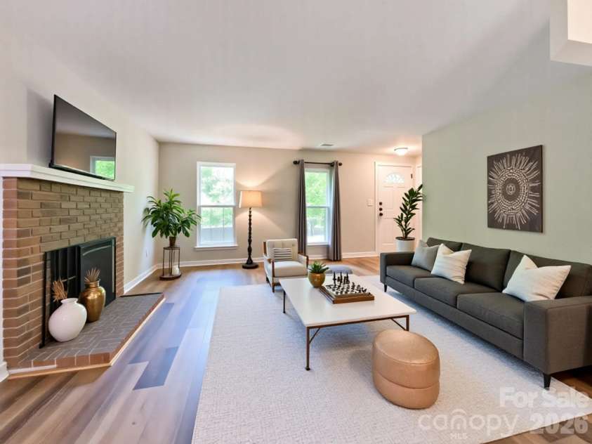 2113 Killarney Place, Charlotte, NC 28262.  MLS# CAR4247042, YatesRealty ID 8697. Virtually staged living room