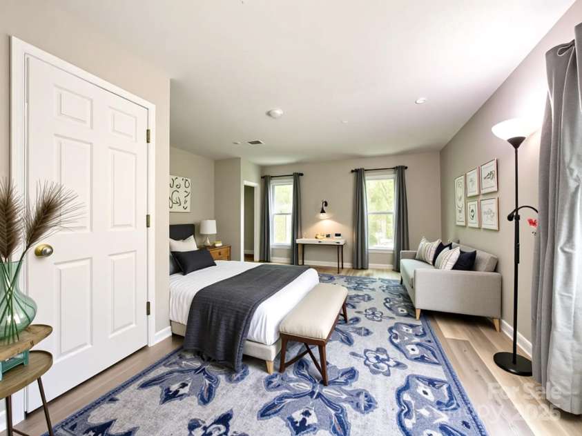 2113 Killarney Place, Charlotte, NC 28262.  MLS# CAR4247042, YatesRealty ID 8697. Virtually staged primary bedroom on first floor 