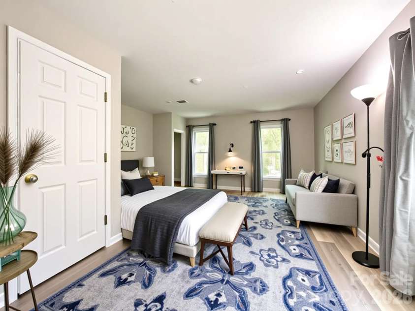 2113 Killarney Place, Charlotte, NC 28262.  MLS# CAR4247042, YatesRealty ID 8697. Virtually staged primary bedroom on first floor 