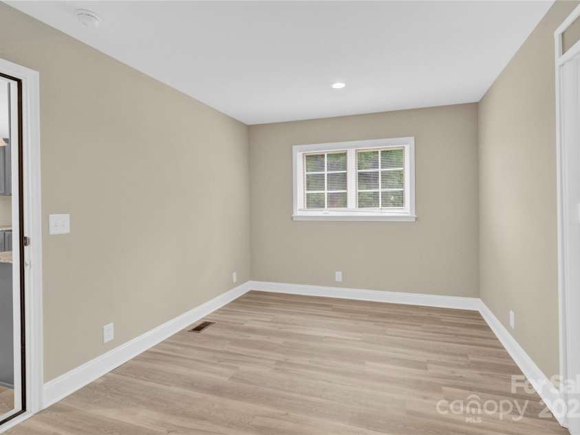 920 Oakridge Farm Highway, Mooresville, NC 28115.  MLS# CAR4228982, YatesRealty ID 8698. Flex space between separate living areas