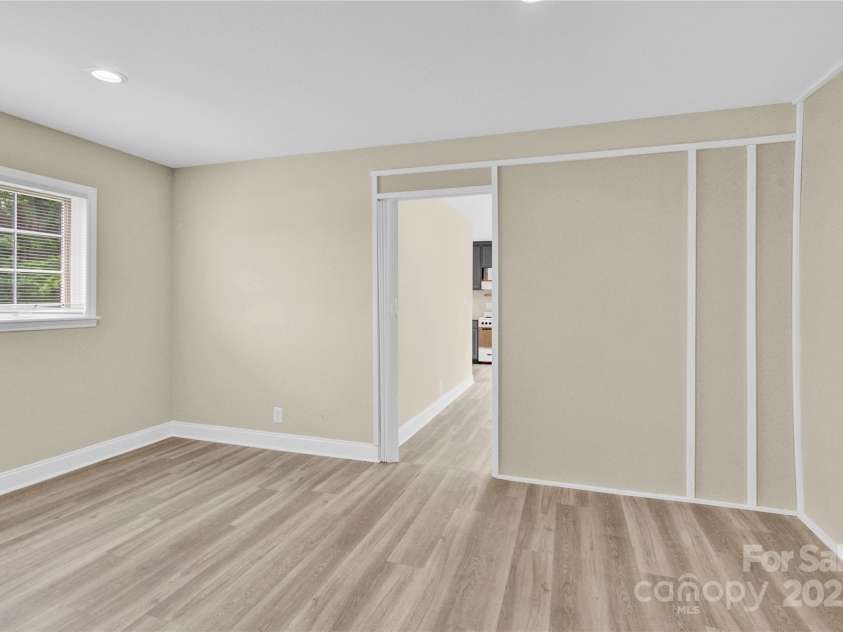 920 Oakridge Farm Highway, Mooresville, NC 28115.  MLS# CAR4228982, YatesRealty ID 8698. Flex space connecting two living areas