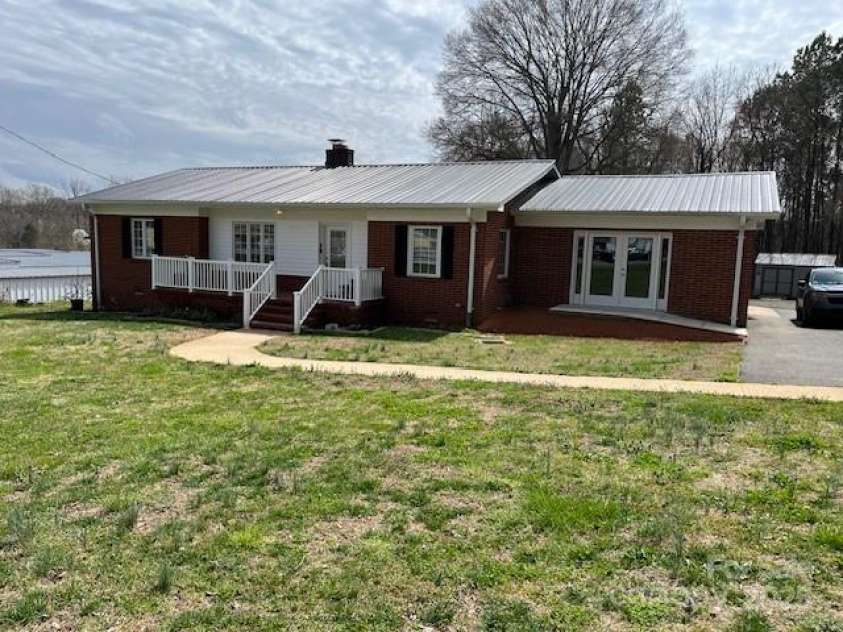 920 Oakridge Farm Highway, Mooresville, NC 28115.  MLS# CAR4228982, YatesRealty ID 8698. Newly installed ADA compliant ramp with new handicap accessible doors