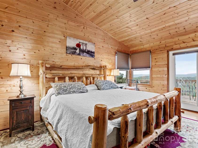 70 Moor Lane, Brevard, NC 28712.  MLS# CAR4134812, YatesRealty ID 87. Super comfortable primary bedroom on main