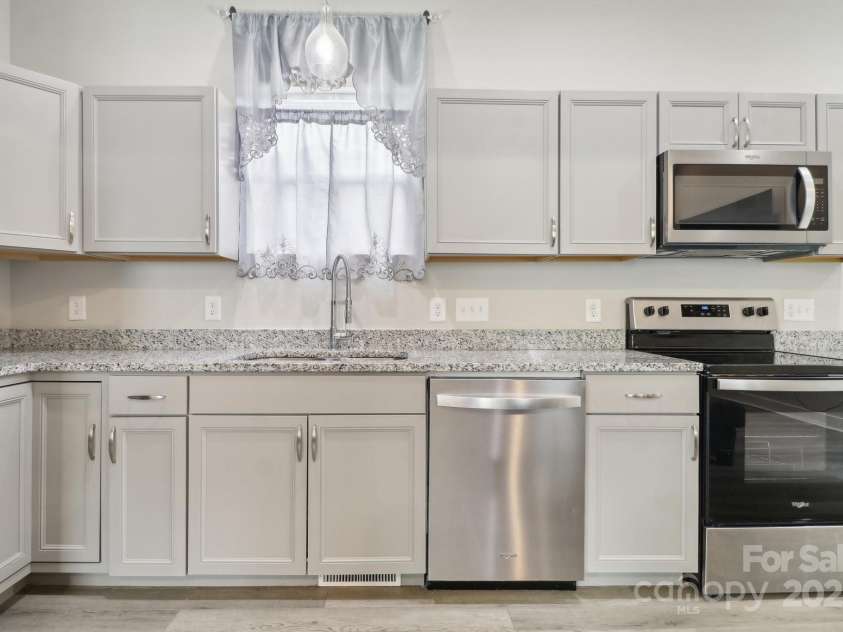 113 Mcgill Avenue, Concord, NC 28025.  MLS# CAR4247749, YatesRealty ID 8703. 