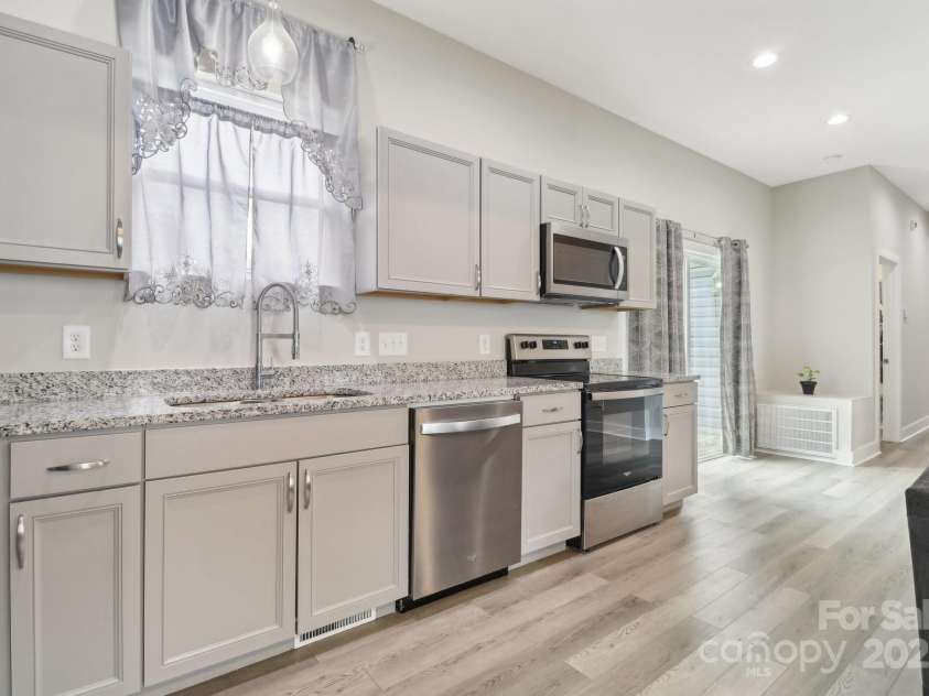 113 Mcgill Avenue, Concord, NC 28025.  MLS# CAR4247749, YatesRealty ID 8703. 