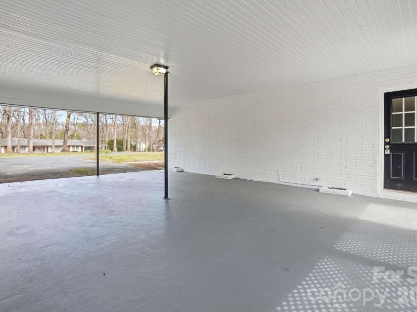 125 Forest Hills Drive, Monroe, NC 28112.  MLS# CAR4355616, YatesRealty ID 8704. Carport