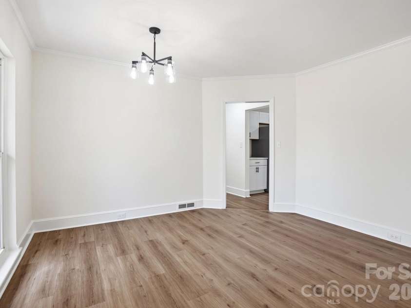 125 Forest Hills Drive, Monroe, NC 28112.  MLS# CAR4355616, YatesRealty ID 8704. Dining Room connects to the Kitchen