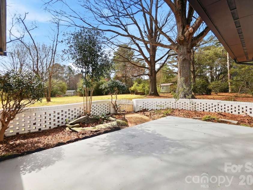 125 Forest Hills Drive, Monroe, NC 28112.  MLS# CAR4355616, YatesRealty ID 8704. Stunning Backyard Patio