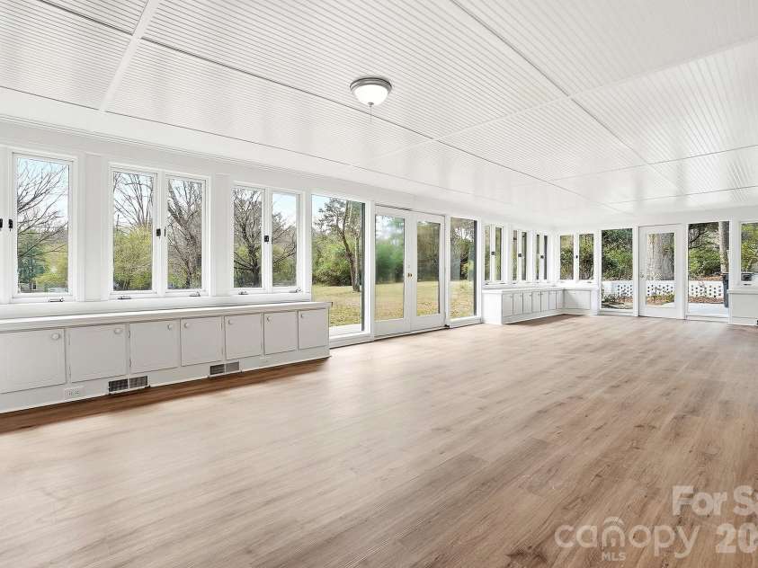 125 Forest Hills Drive, Monroe, NC 28112.  MLS# CAR4355616, YatesRealty ID 8704. Stunning Sunroom