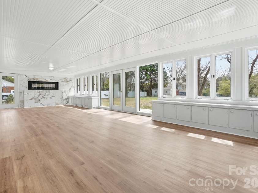 125 Forest Hills Drive, Monroe, NC 28112.  MLS# CAR4355616, YatesRealty ID 8704. Stunning Sunroom