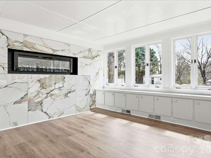 125 Forest Hills Drive, Monroe, NC 28112.  MLS# CAR4355616, YatesRealty ID 8704. Stunning Sunroom