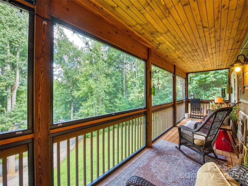 61 Calm Creek Road, Waynesville, NC 28785.  MLS# CAR4213284, YatesRealty ID 8705. Downstairs covered deck