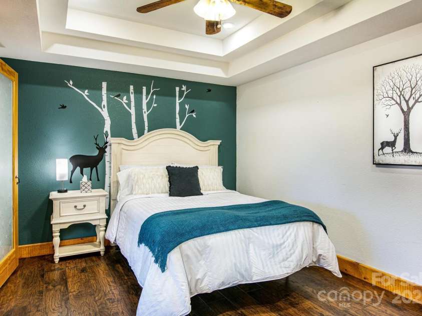 61 Calm Creek Road, Waynesville, NC 28785.  MLS# CAR4213284, YatesRealty ID 8705. Lovely ensuite downstairs